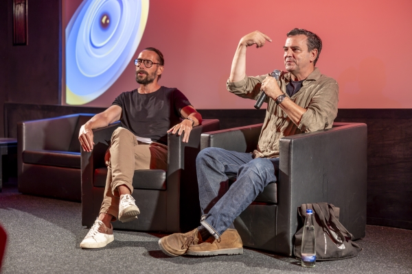 Dr. Alexander Gutzmer (Quadriga Hochschule Berlin), Christian Petzold (Regisseur WOLFSBURG und Ehrengast)  (© Pavel Broz)